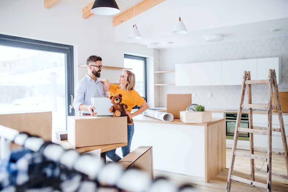 happy family moving into new custom home